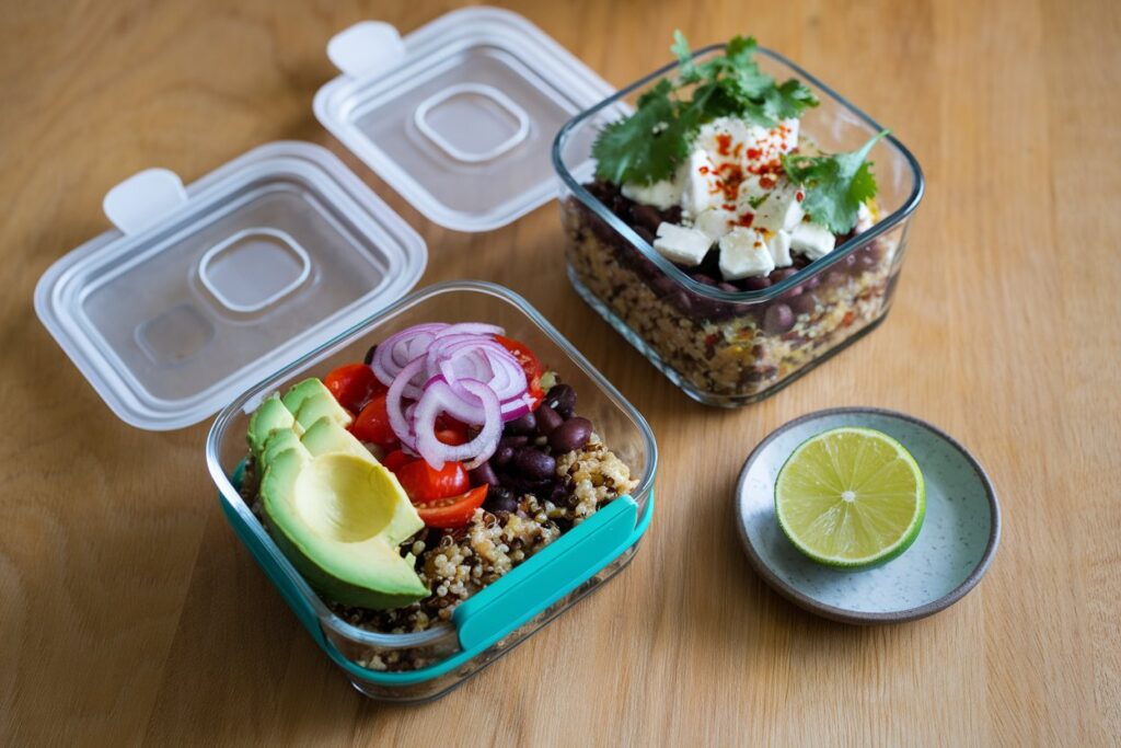 quinoa black bean bowl in glass containers to go lunch